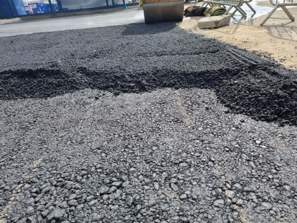 This is tarmac being laid by NS Driveways Cranleigh